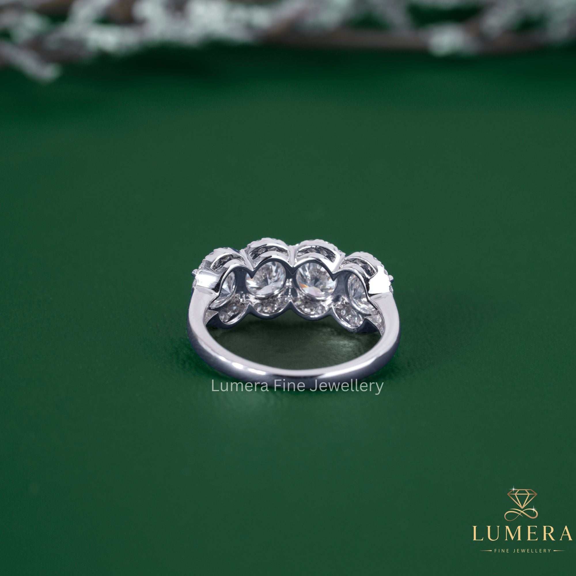 Halo wedding band with four stone diamond band.