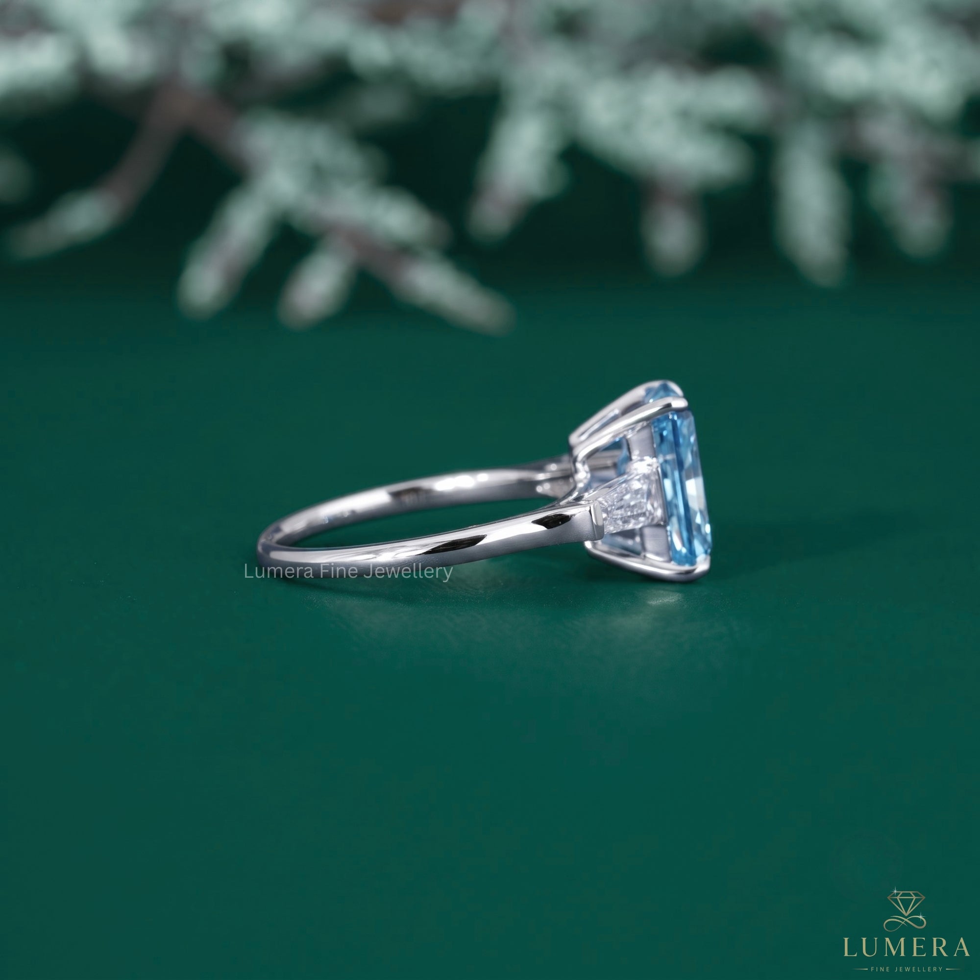 Three stone engagement ring with claw prong setting.