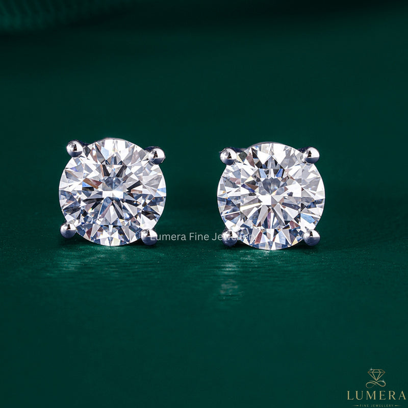 solitaire earrings with round diamond earrings.
