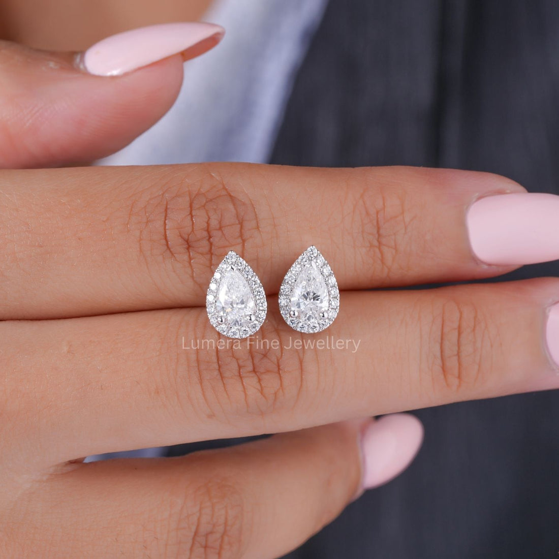 lab grown diamond with solid gold earrings.
