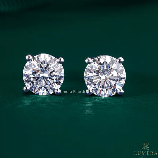 Solitaire round cut diamond stud earrings