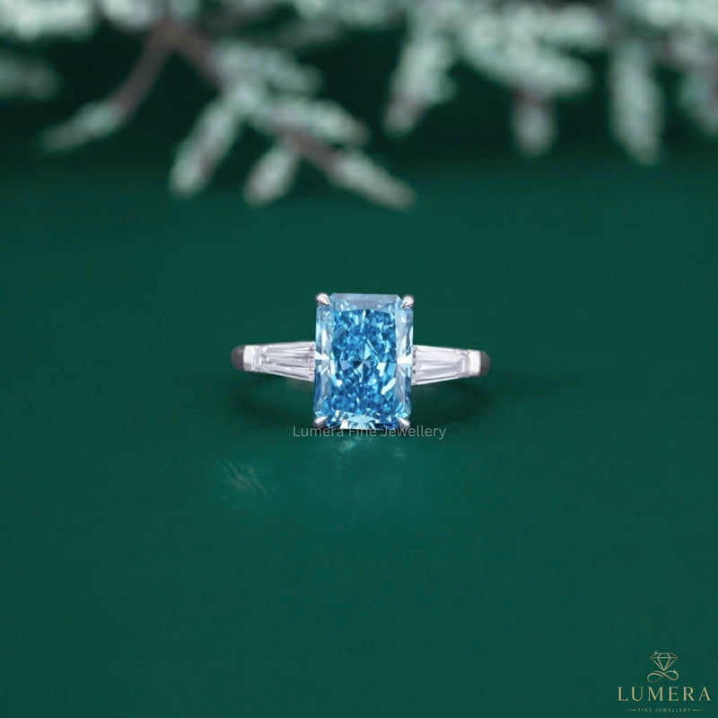 Blue diamond engagement ring with blue diamond ring.