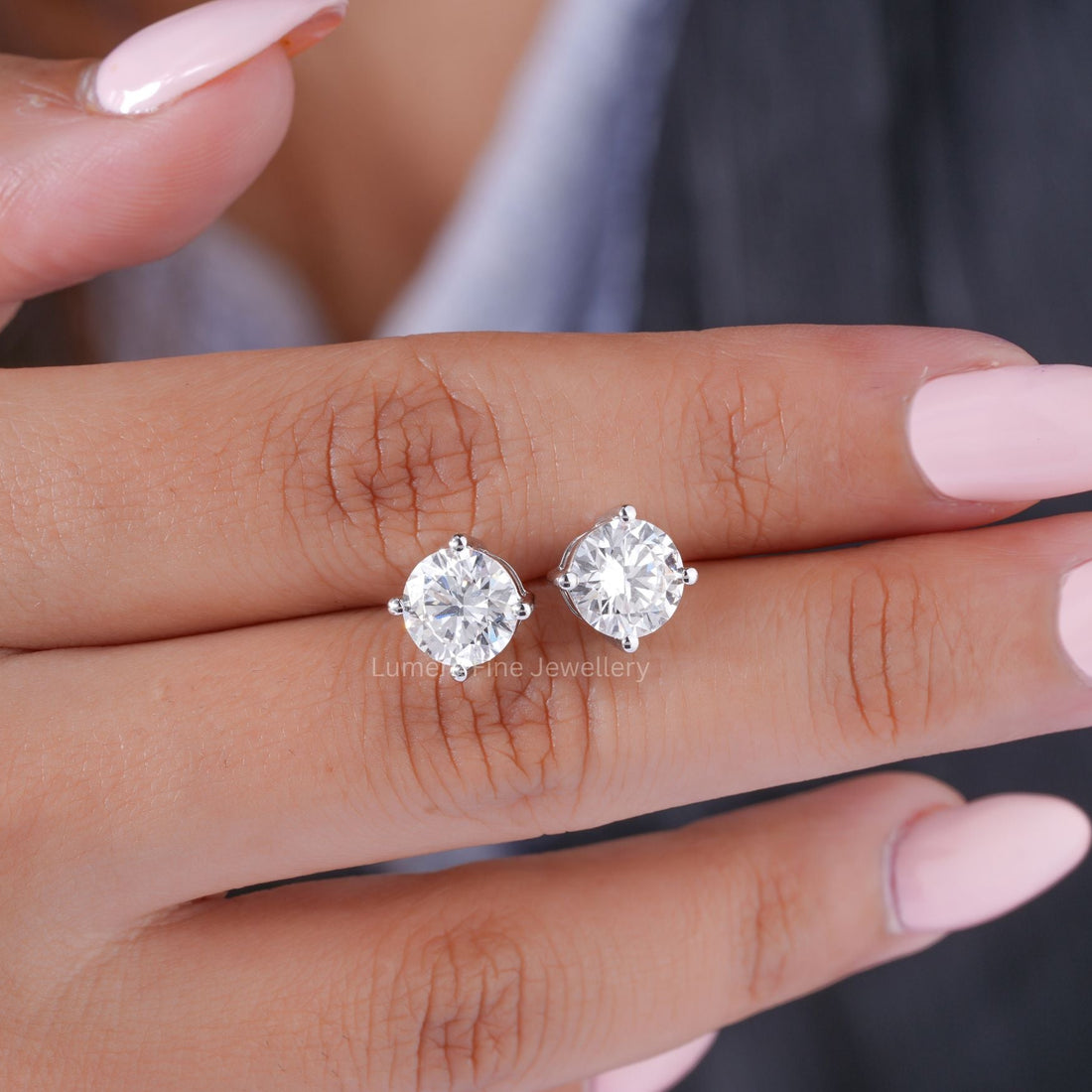 lab grown diamond with solid gold earrings.
