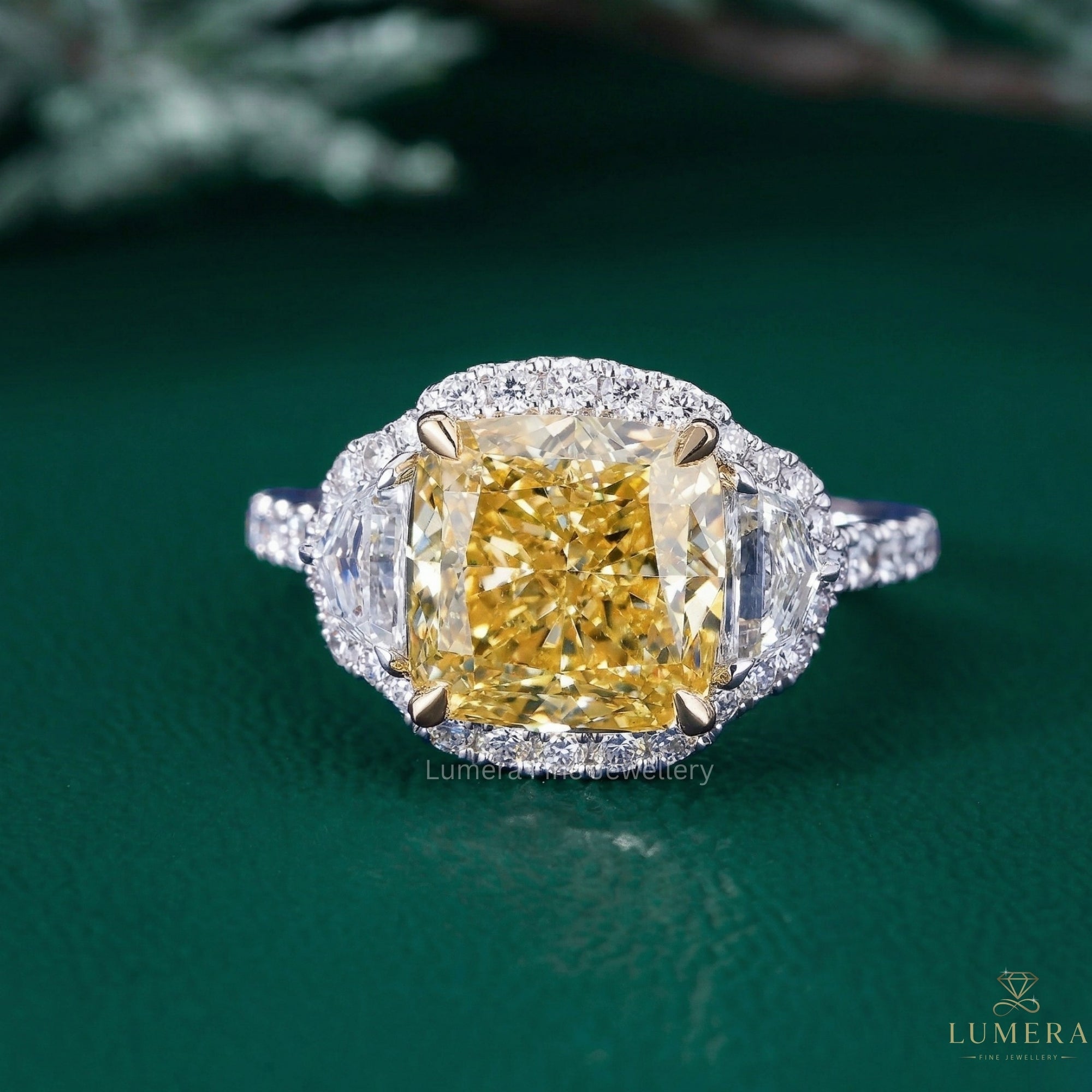 cushion cut yellow diamond ring with cadillac cut diamond.