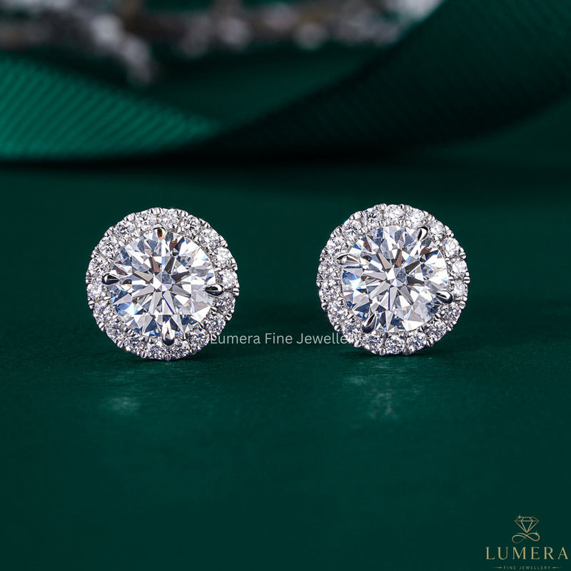 round diamond halo earrings with halo stud earrings.
