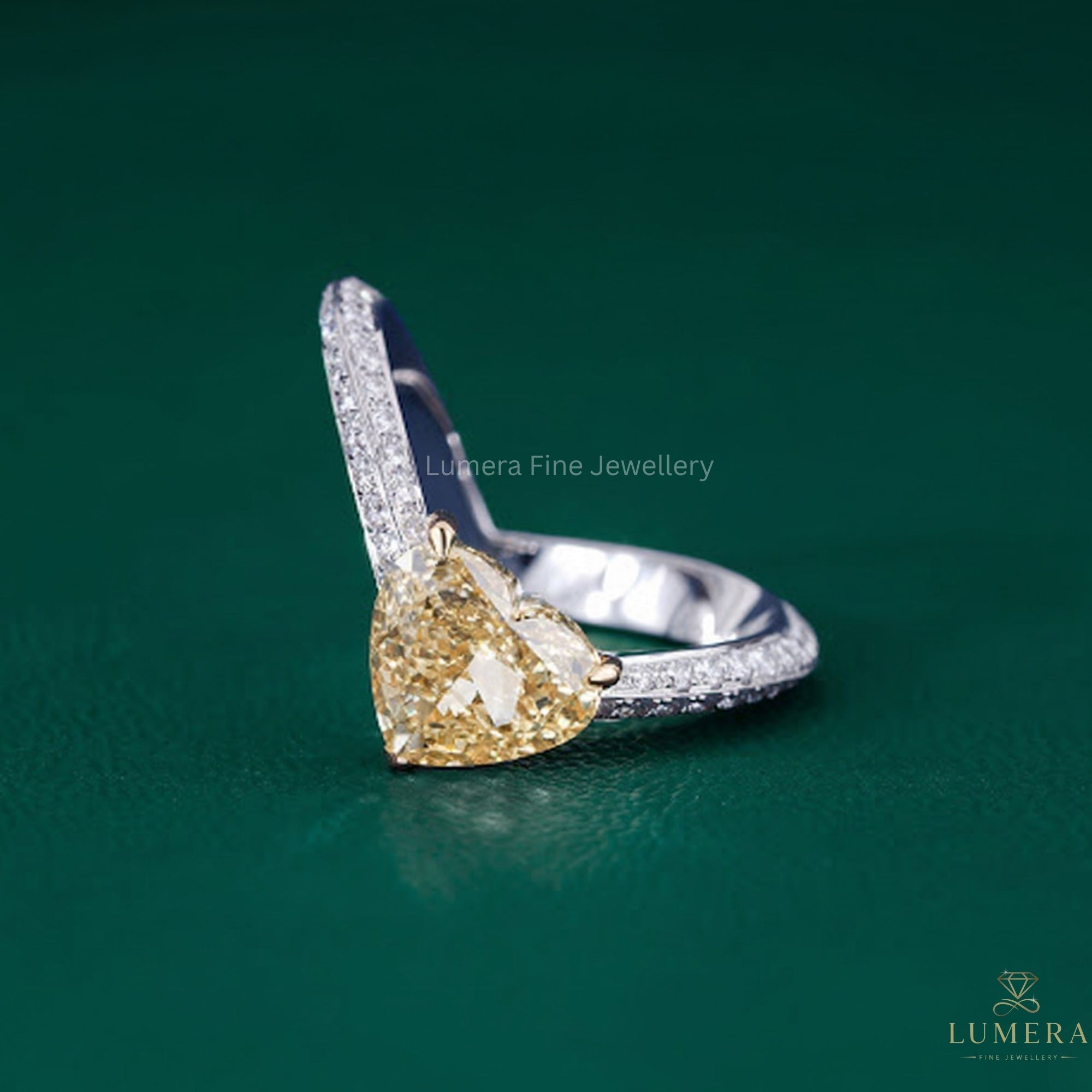 yellow stone heart ring with heart shaped engagement ring.