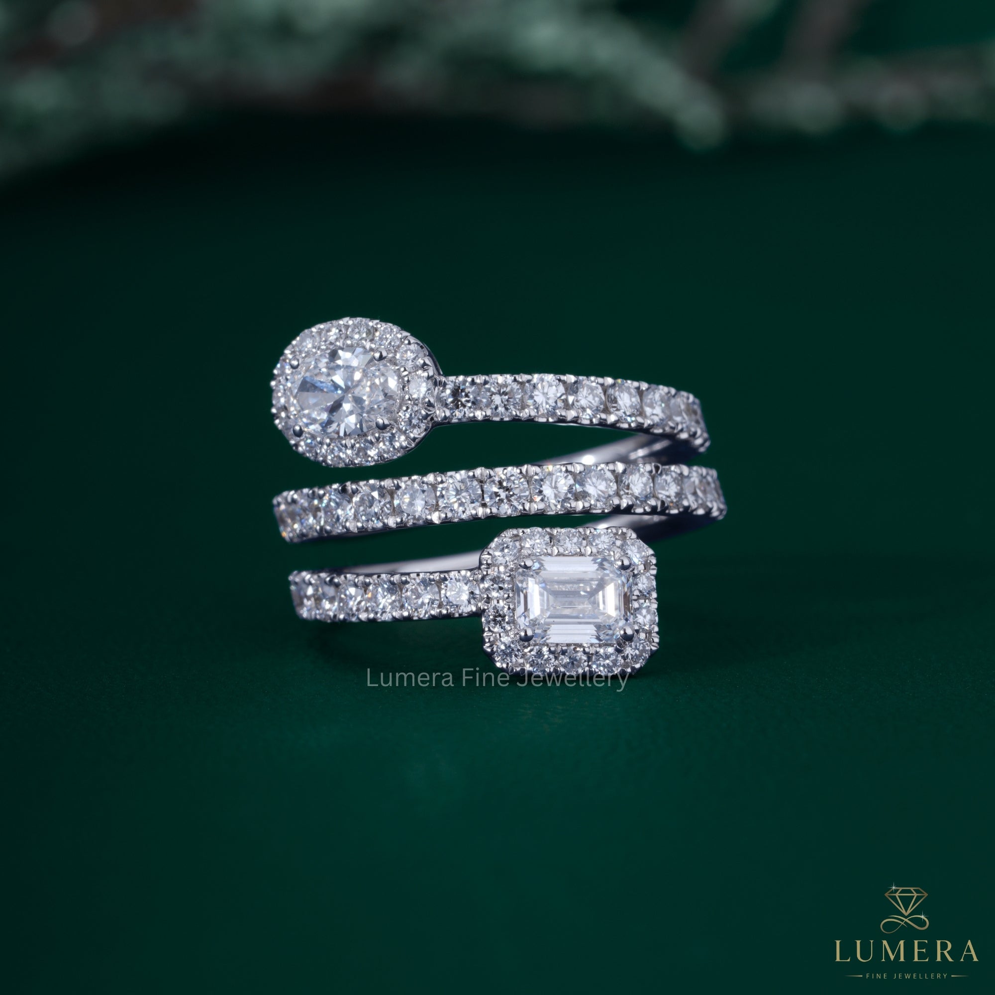 Oval emerald diamond wedding band with spiral wedding band.