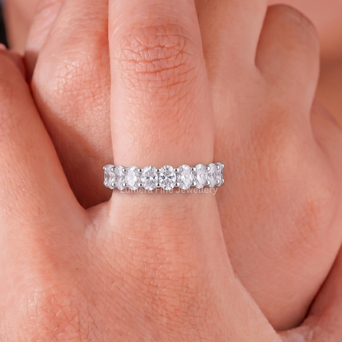 oval cut band with micro u prong band.

