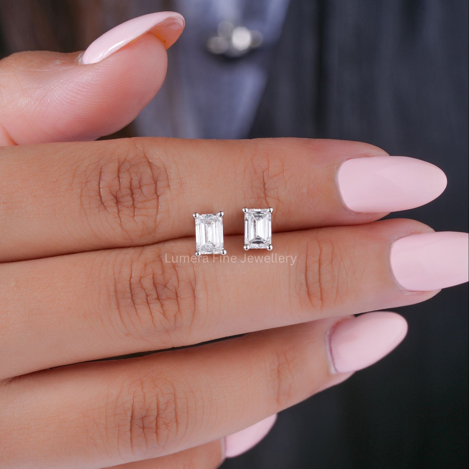 emerald cut earrings with diamond stud earrings.
