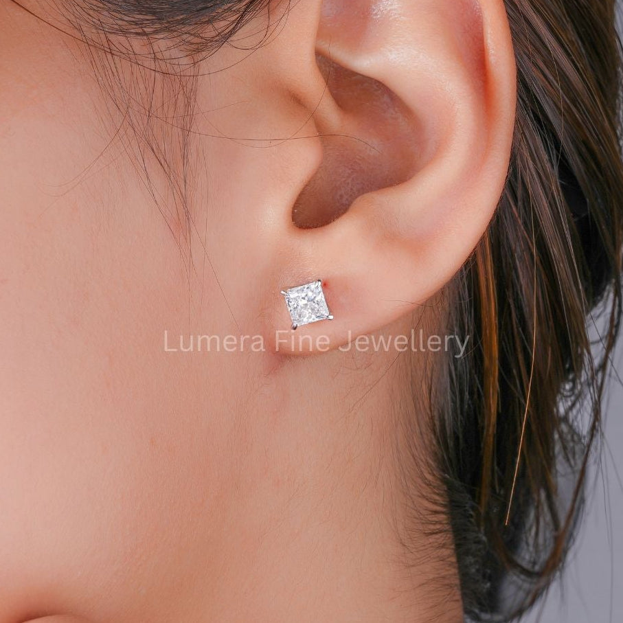 lab grown diamond with solid gold earrings.
