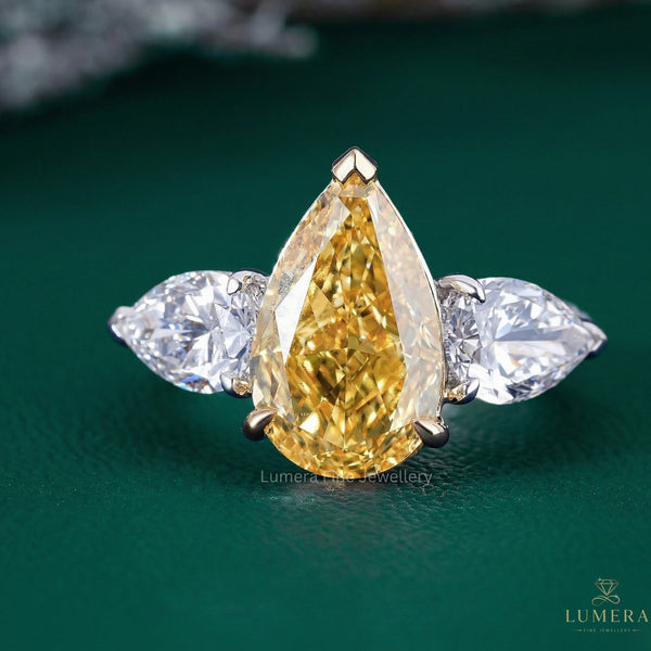 Pear Shaped Engagement Ring with yellow pear diamond ring.