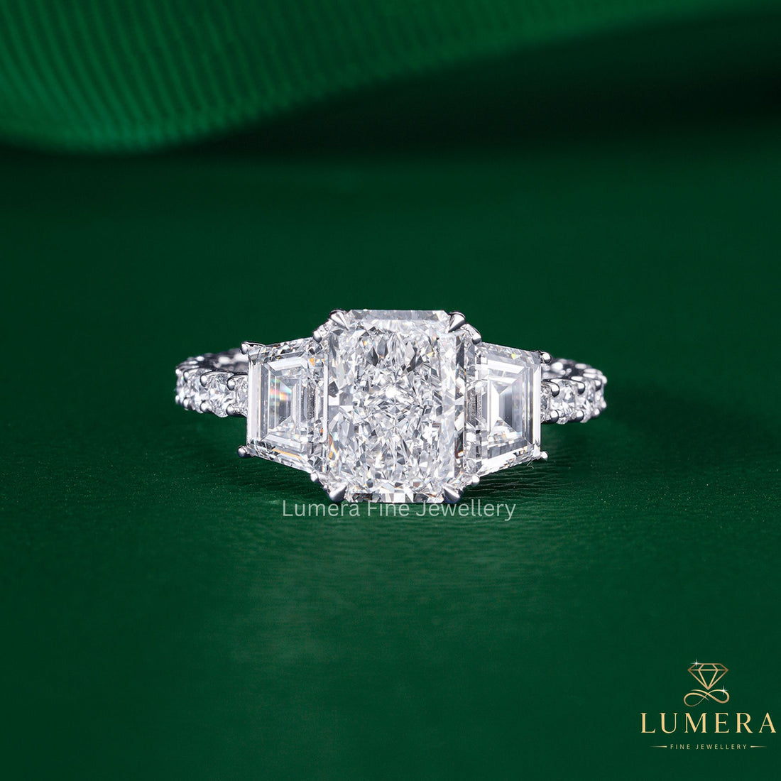 Radiant Cut Engagement Ring with trapezoid side stone.

