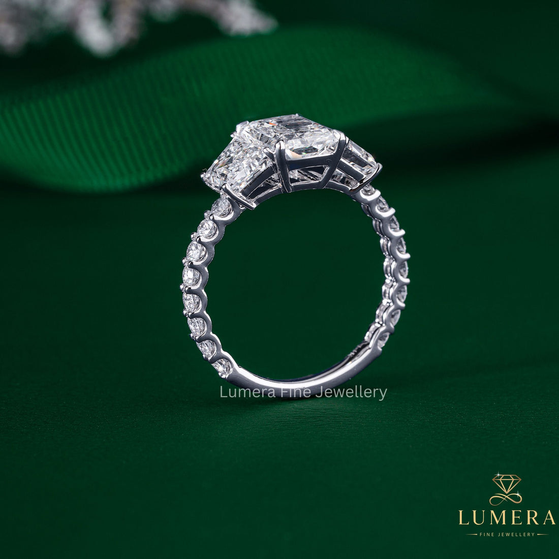 Radiant Cut Engagement Ring on three stone ring.
