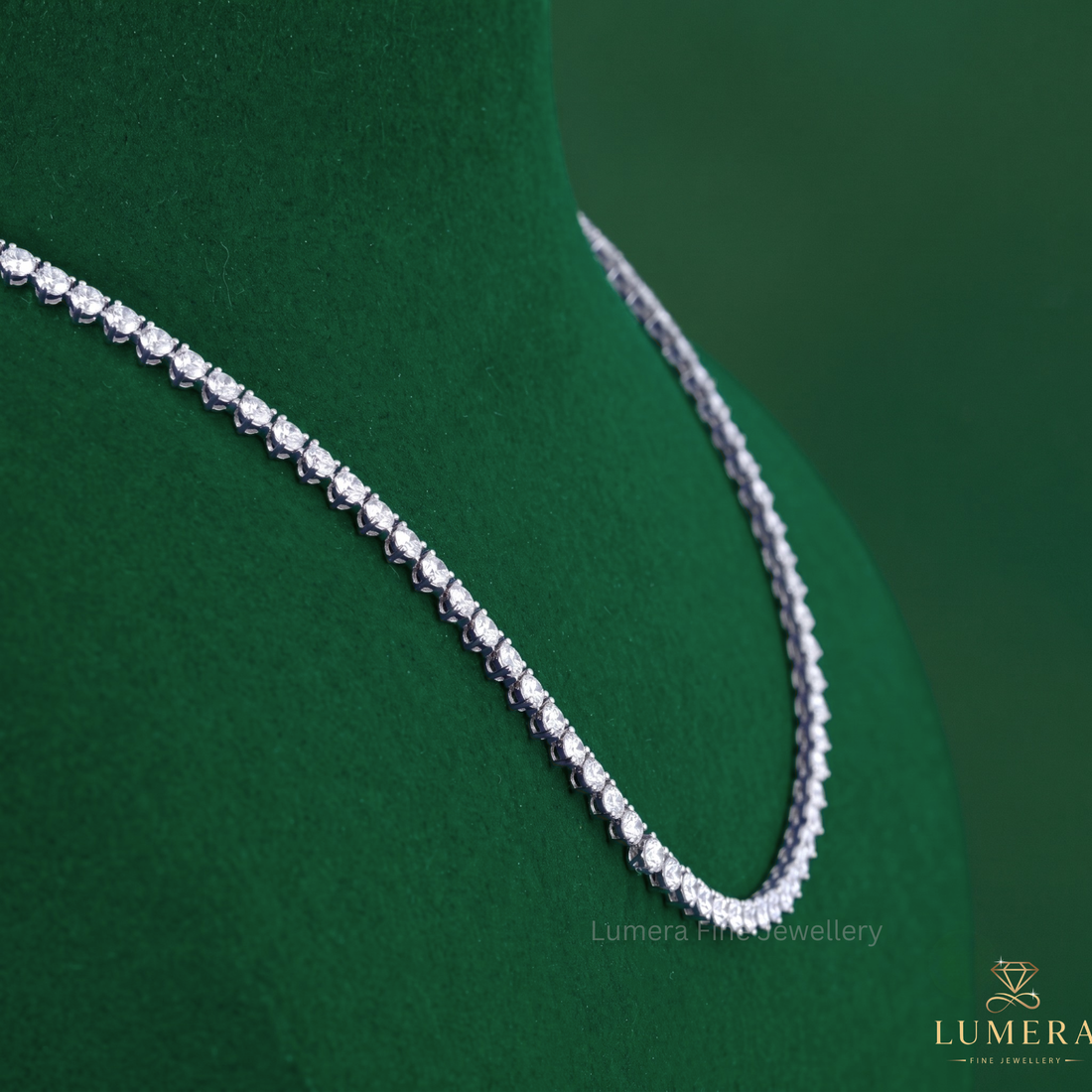Stackable necklace featuring a round diamond necklace.