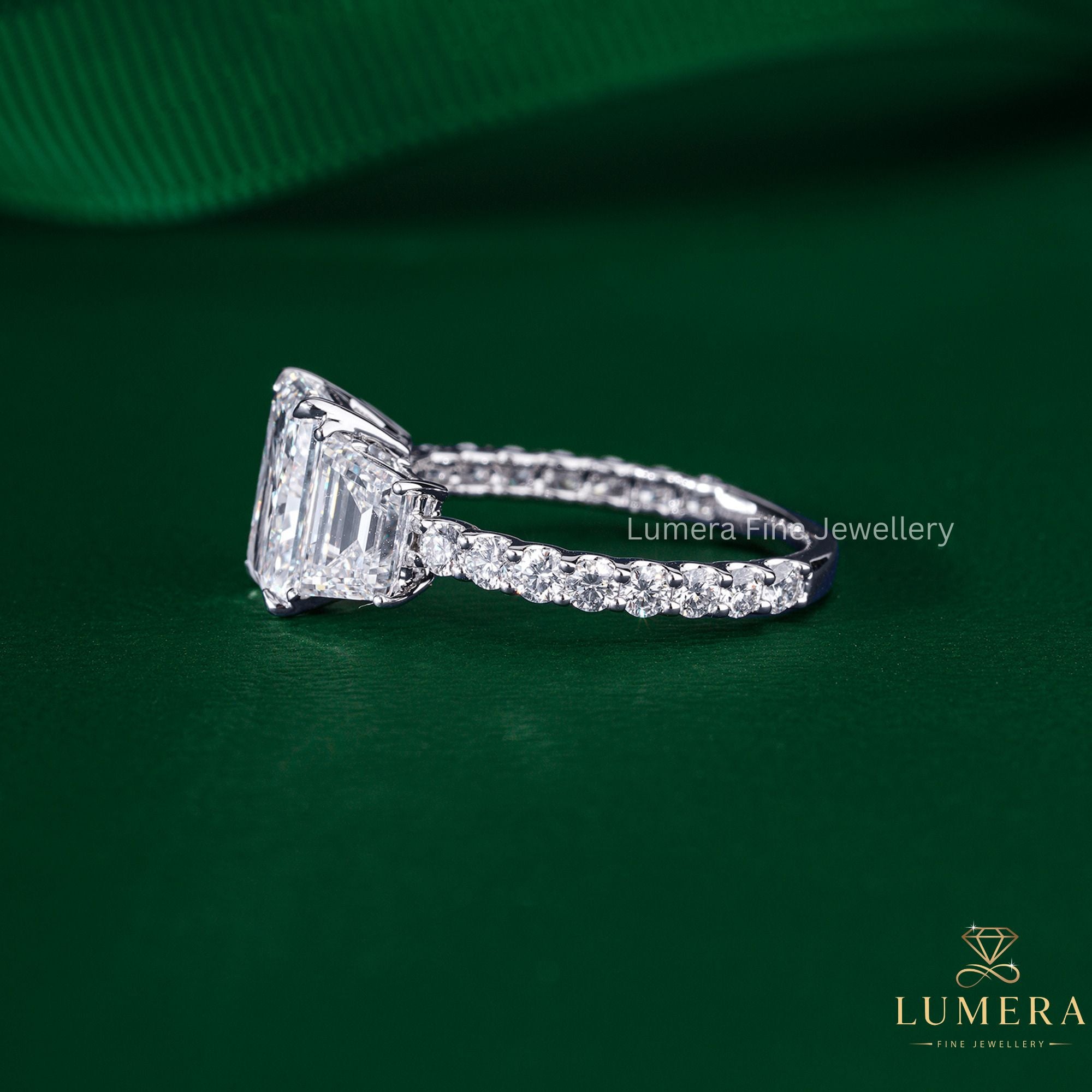 pave setting ring with radiant with trapezoid stone.
