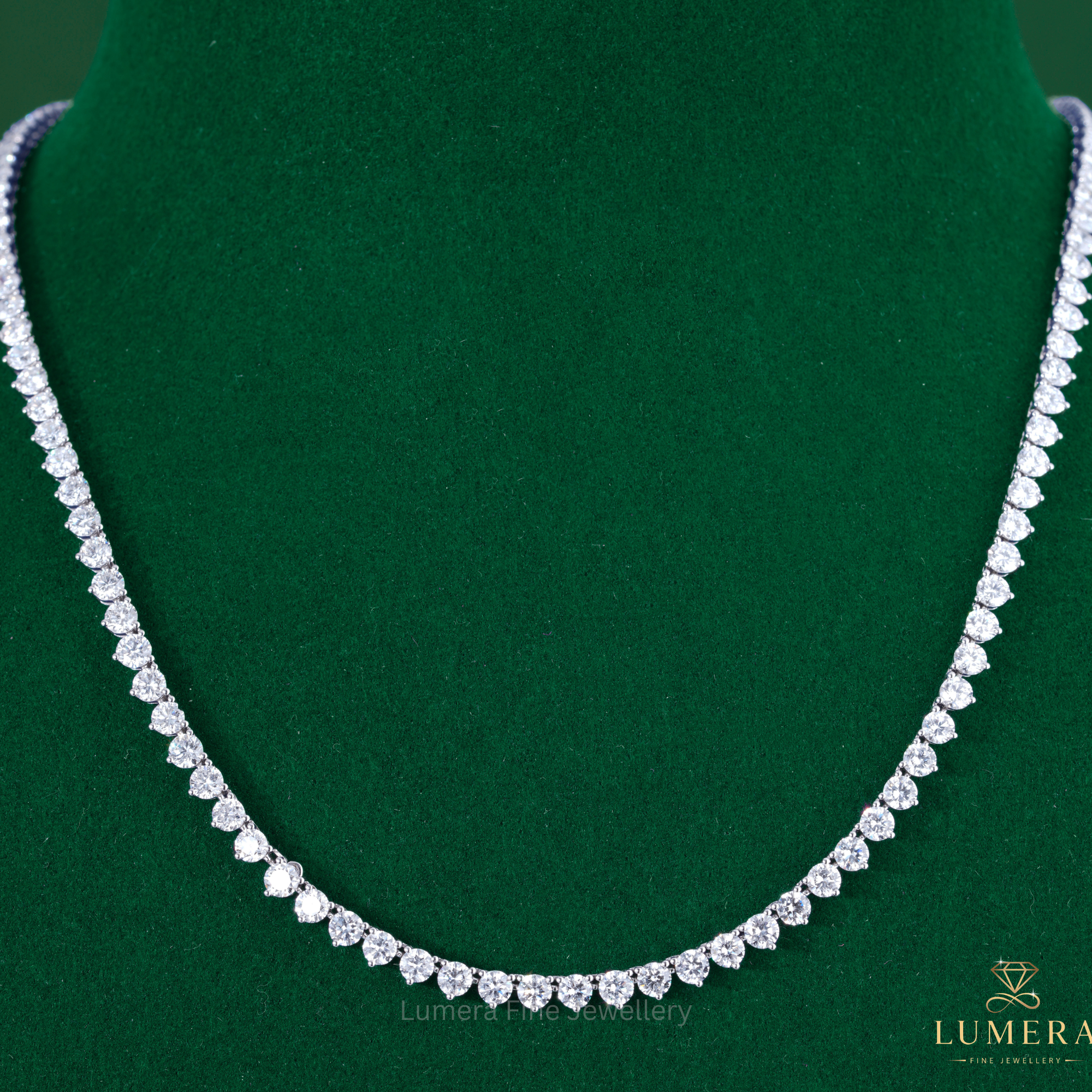Round brilliant tennis necklace paired with a round tennis necklace.