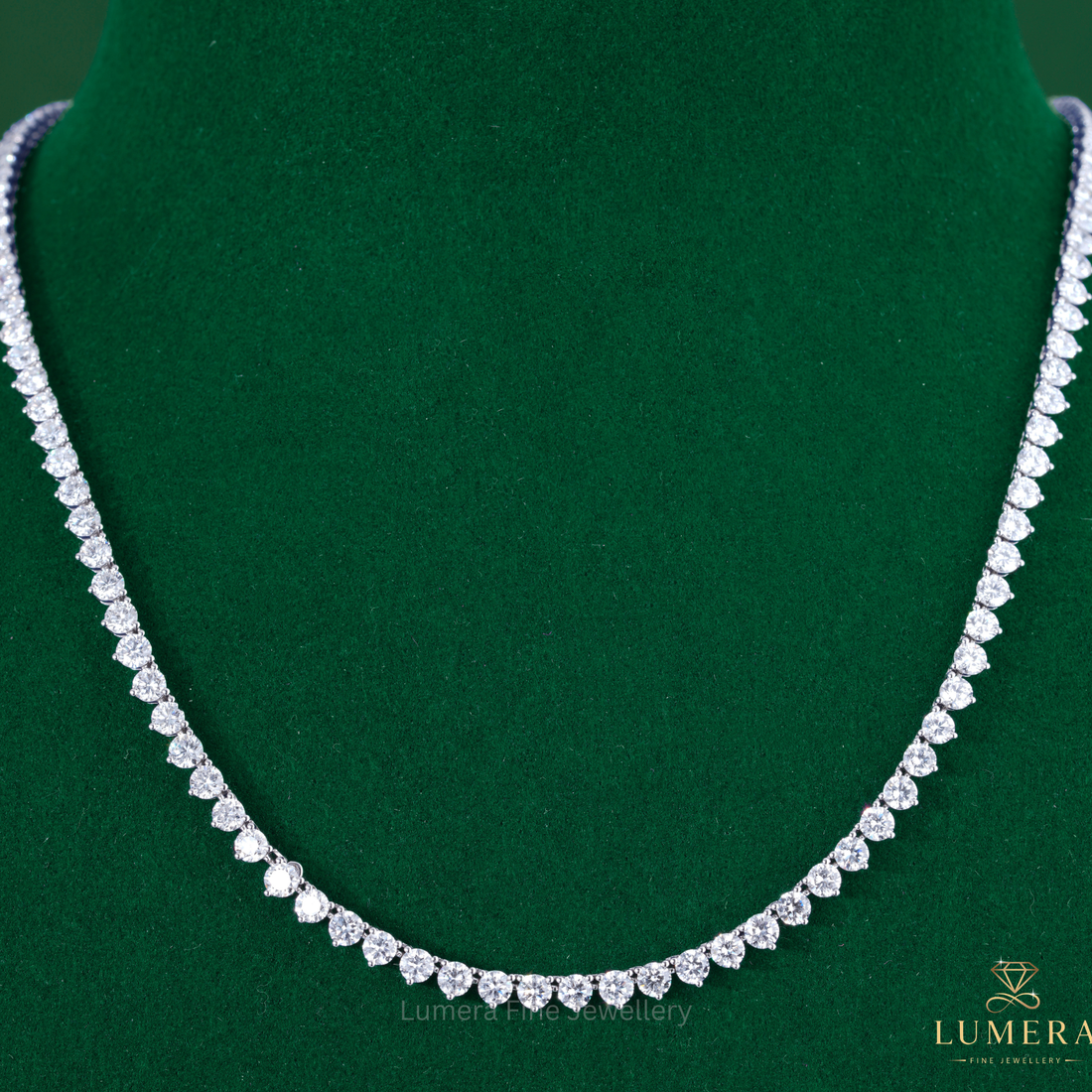 Round brilliant tennis necklace paired with a round tennis necklace.