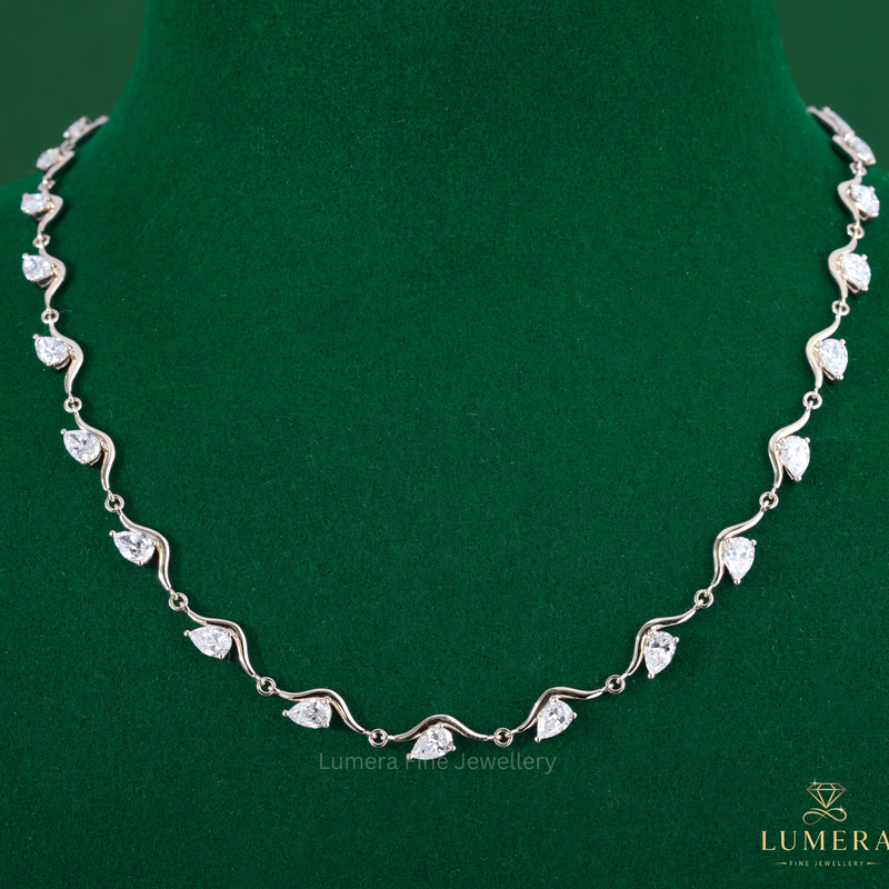 Curved wave Pear Cut Diamond Station Necklace