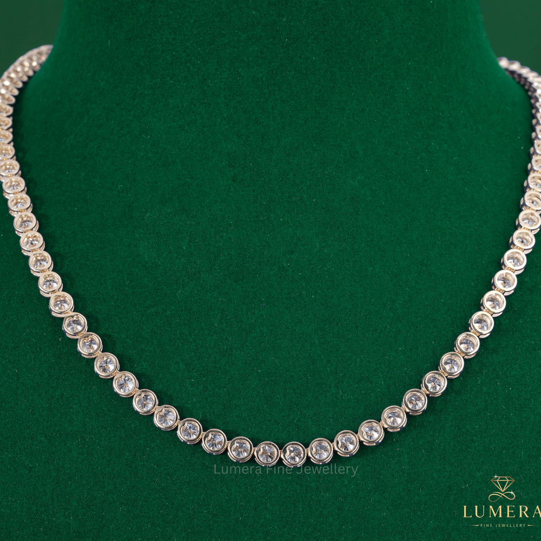 Bezel set diamond necklace featuring a round diamond necklace.