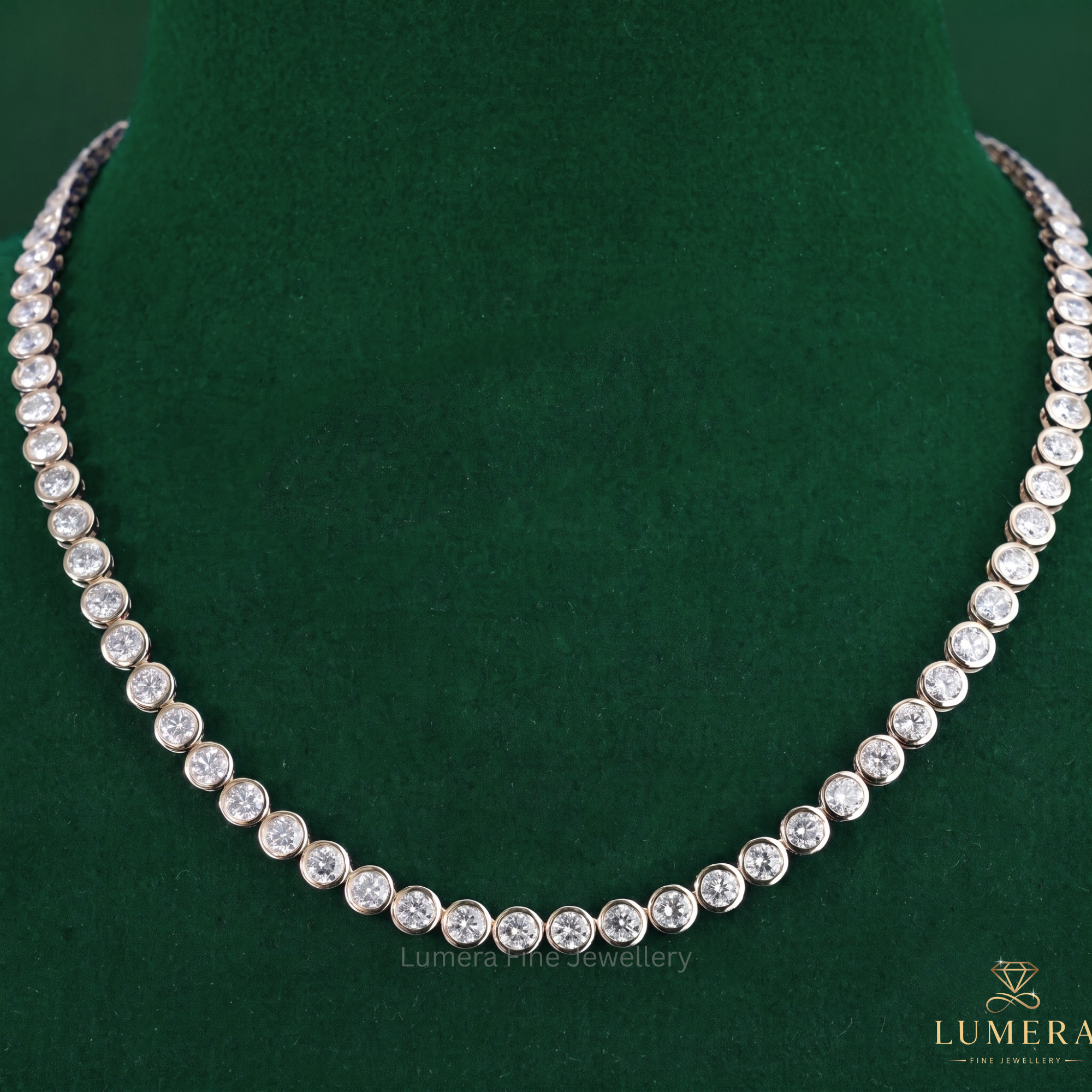 Bezel set diamond tennis necklace paired with a solid gold necklace.