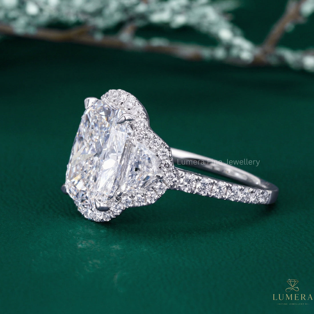 cushion cut halo engagement ring with three stone engagement ring.