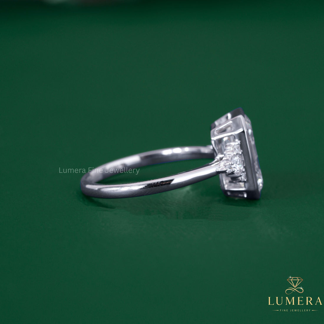 Muse setting ring with side stone engagement ring.