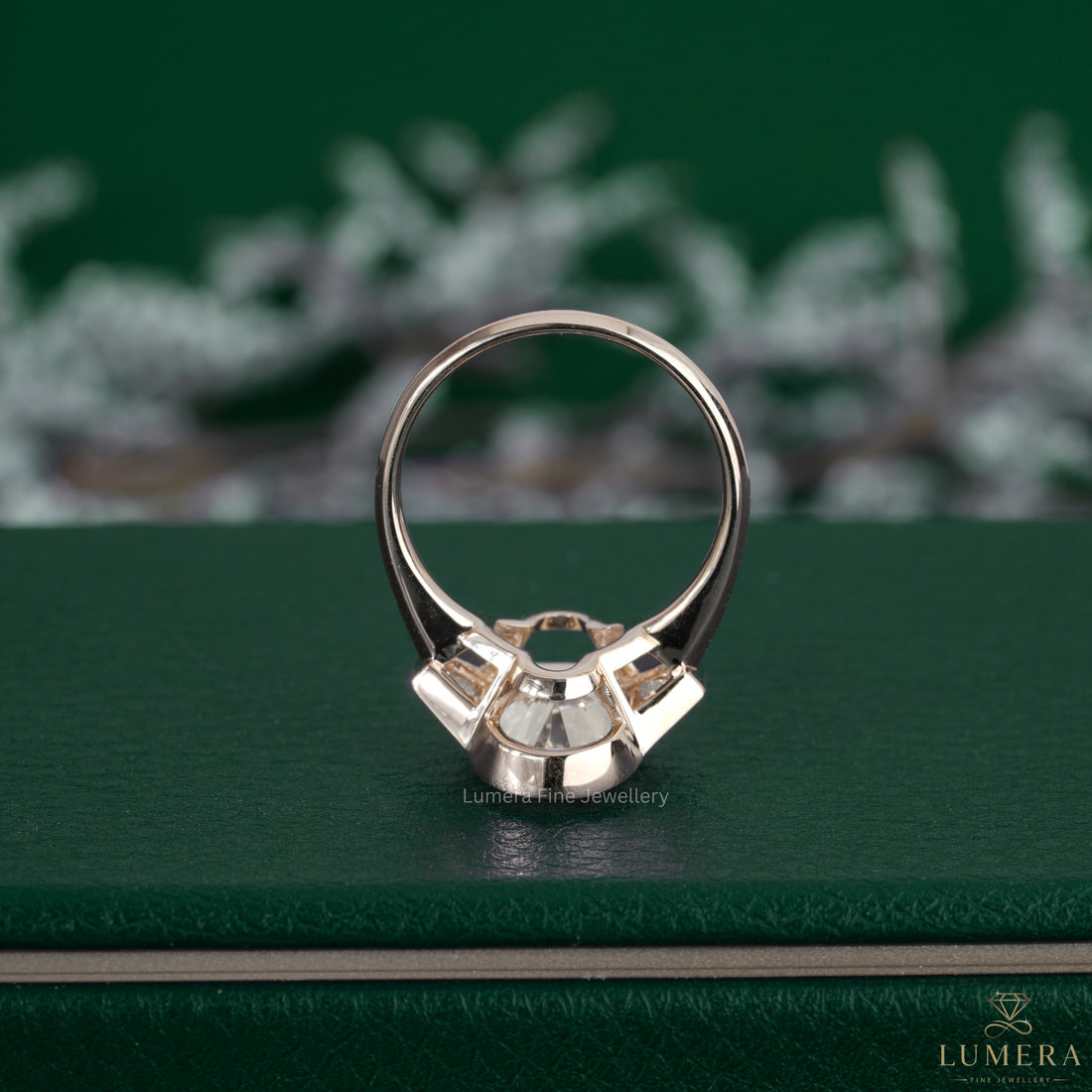 Lab diamond oval cut ring paired with a trilogy ring.