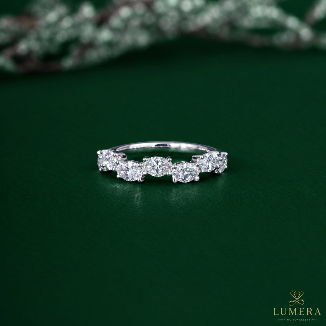 oval diamond half eternity wedding band.