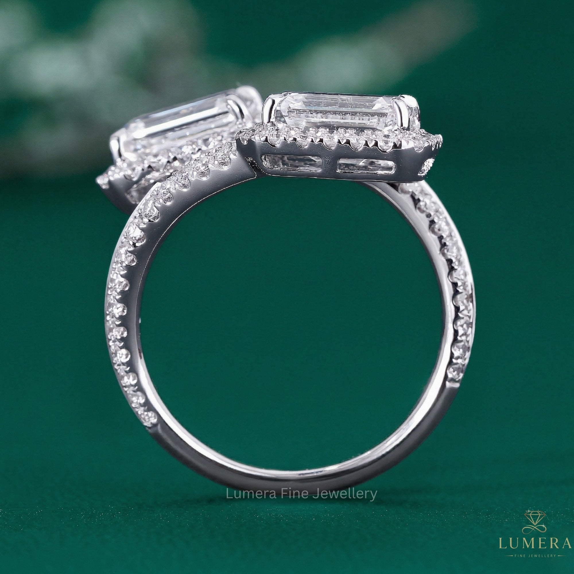 toi et moi ring with emerald diamond ring.