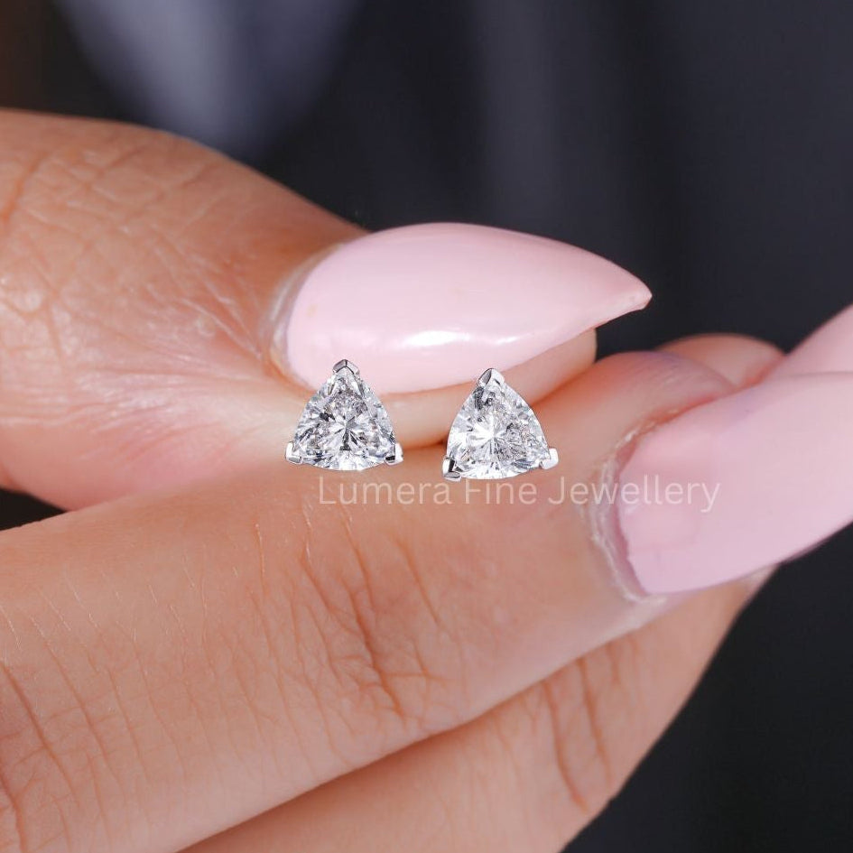 trillion cut earrings with triangle shape earrings.
