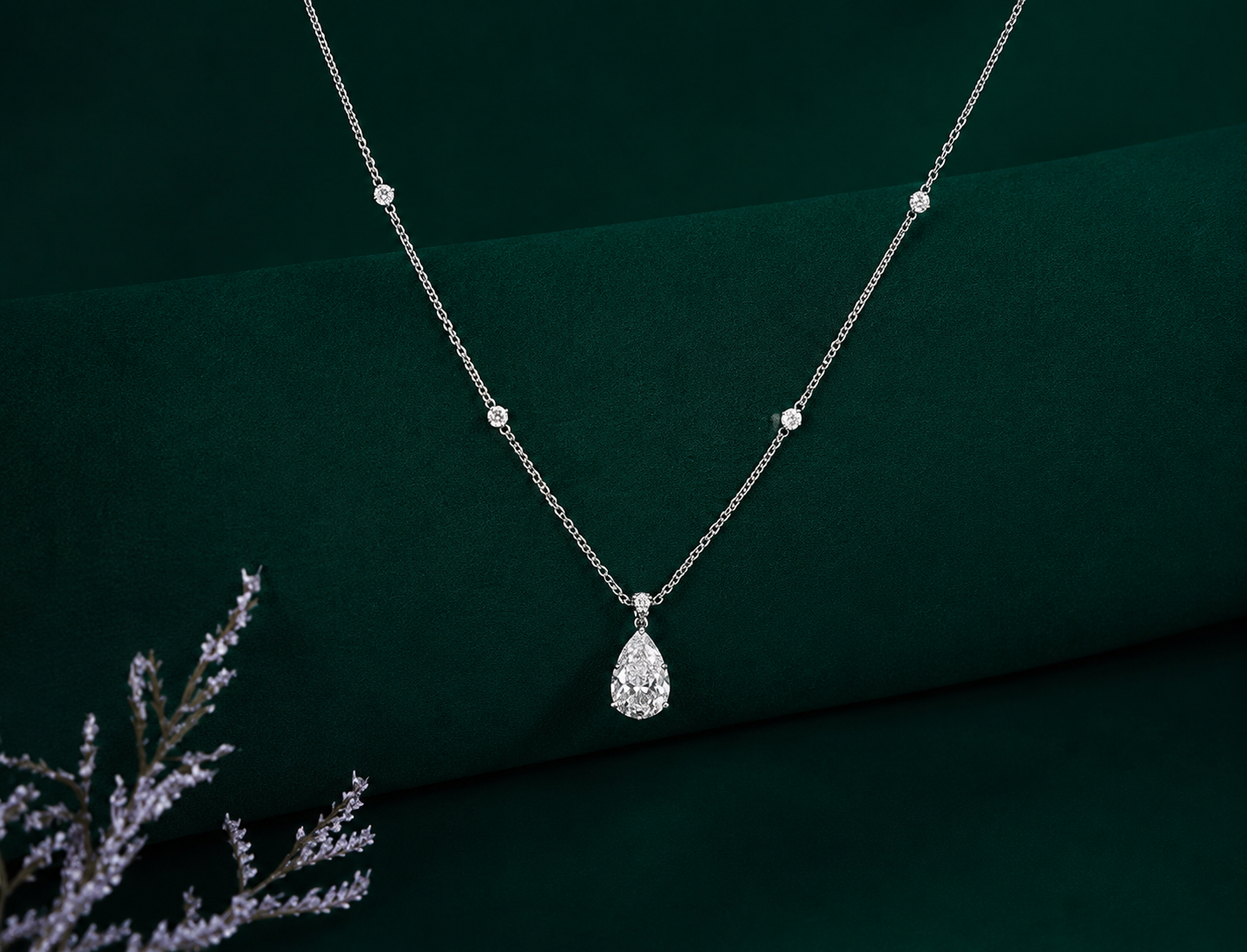 pear shape diamond pendant with V prong setting.
