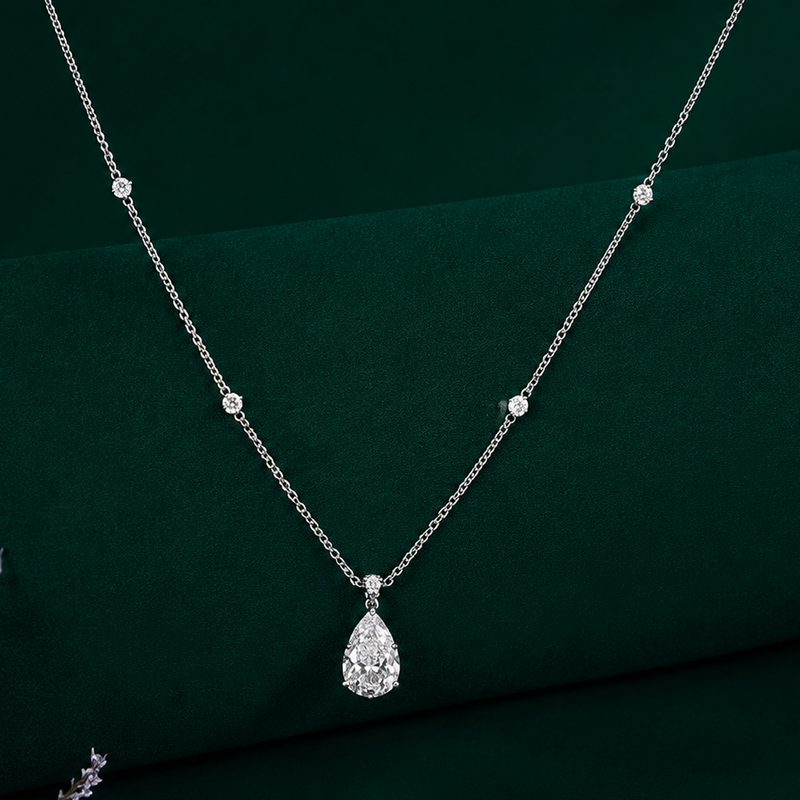 pear shape diamond pendant with V prong setting.

