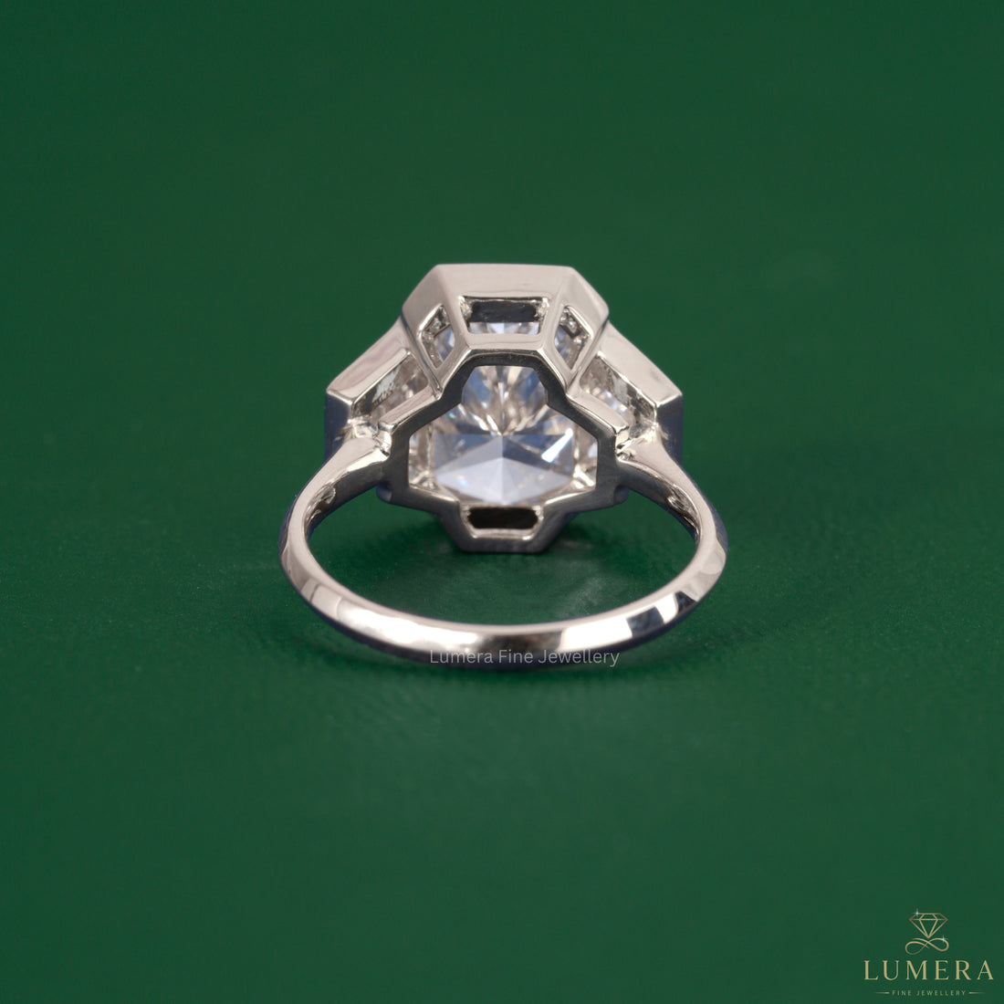Radiant cut ring featuring a knife edge setting ring.