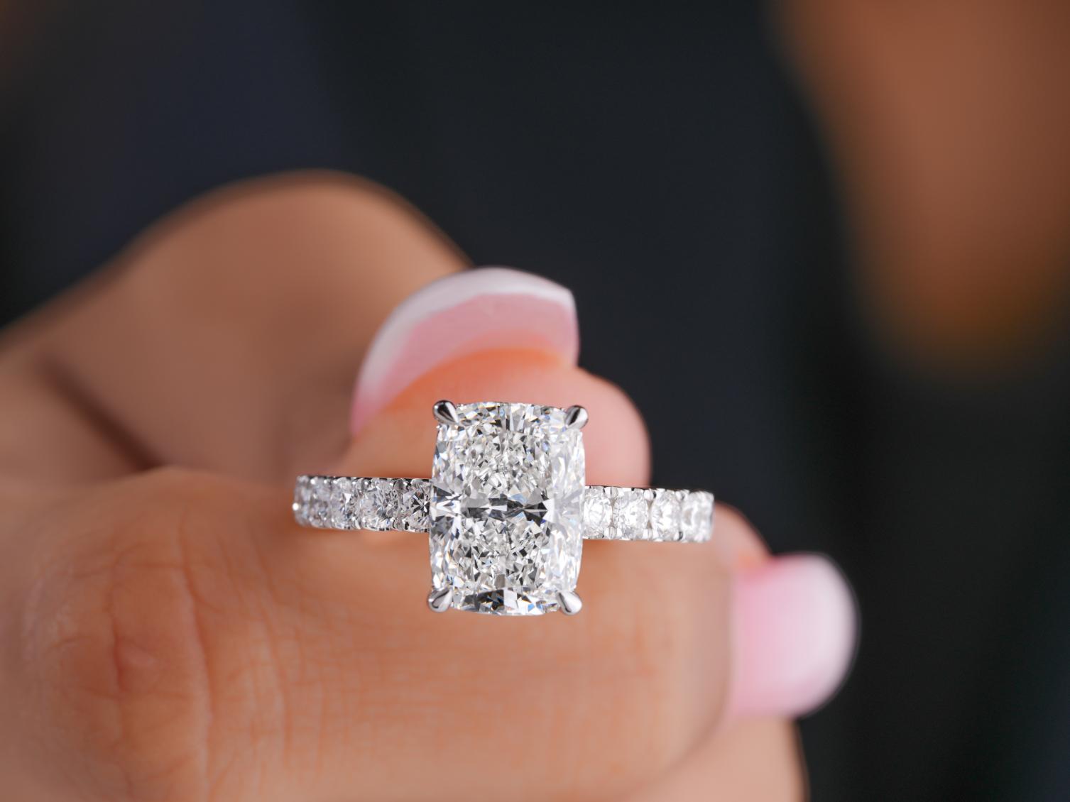 cushion cut engagement ring in cushion cut hidden halo engagement ring style.
