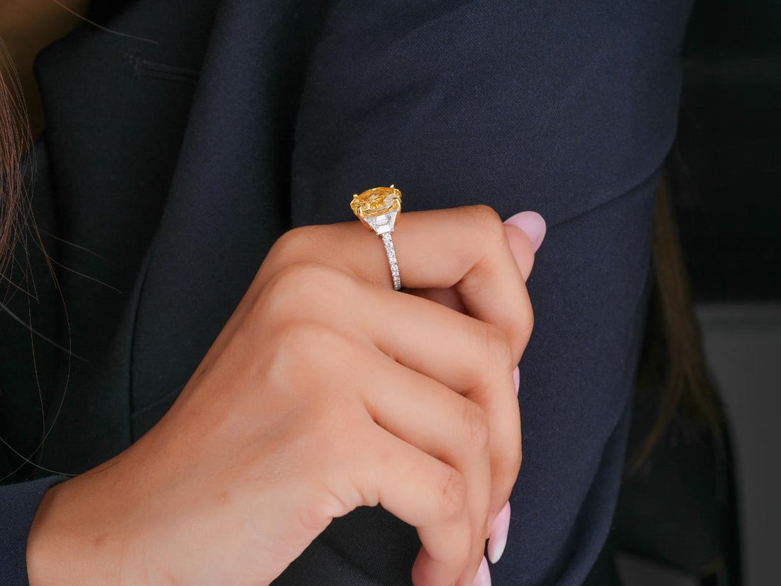 oval cut with trapezoid side stones with trillion engagement ring.
