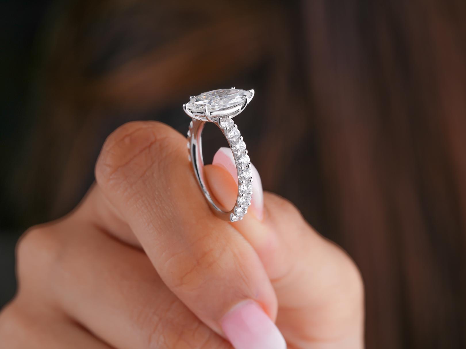 claw prong ring with solid gold ring.
