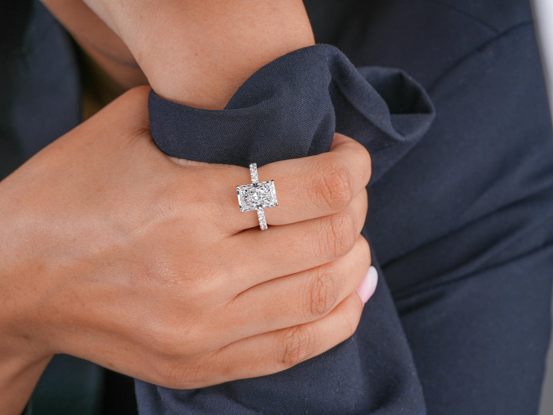 cushion cut diamond ring in pave setting band style.
