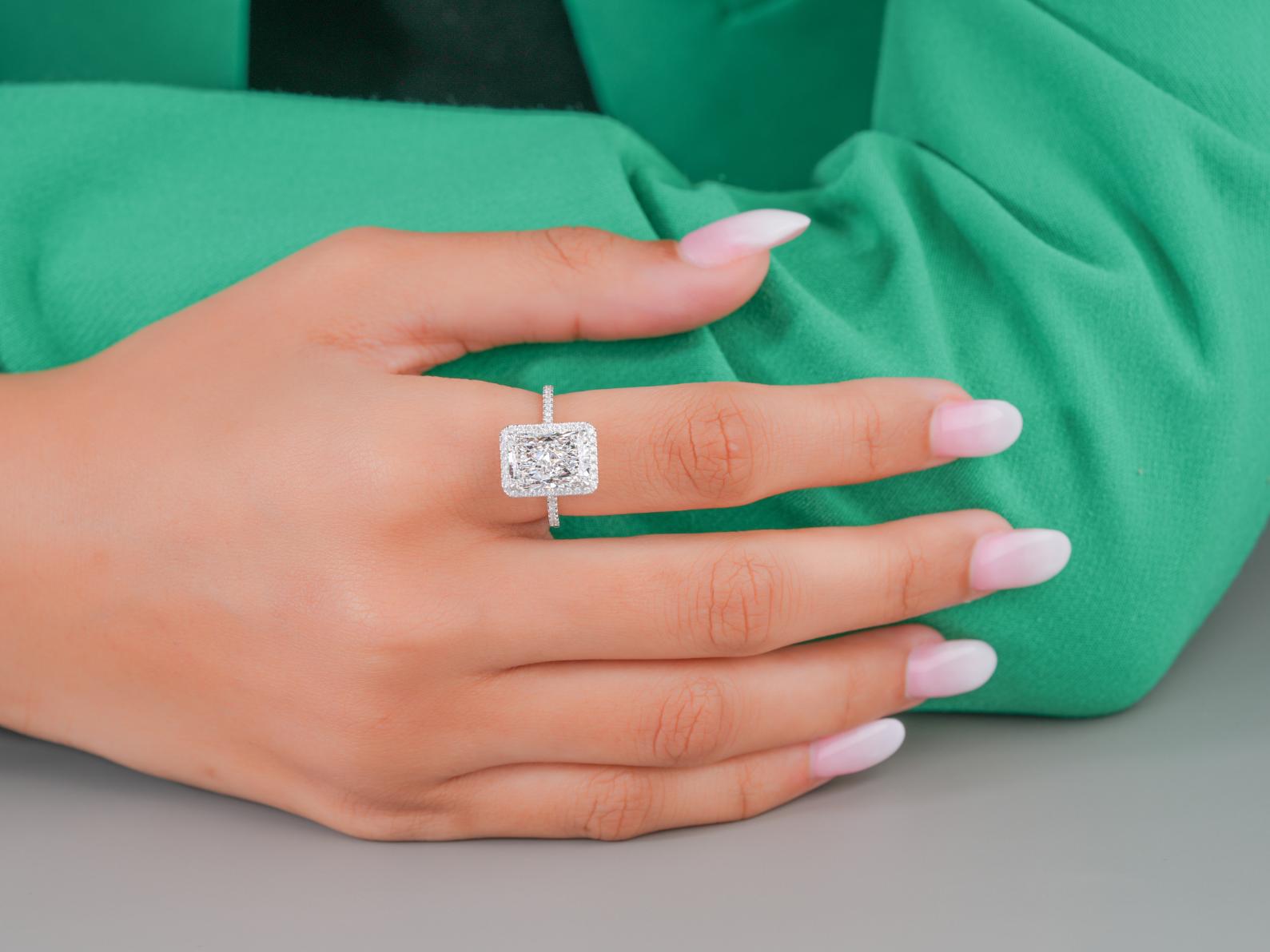 radiant cut engagement ring in pave setting ring style.
