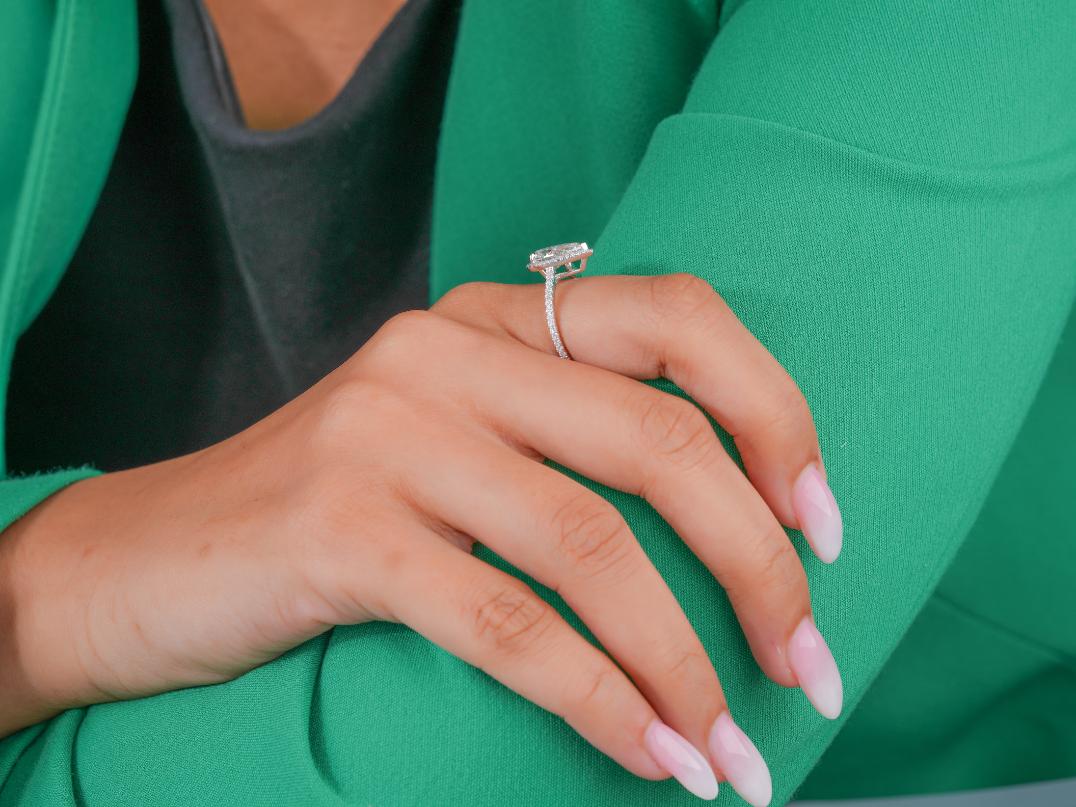 halo diamond engagement ring with cathedral setting ring.
