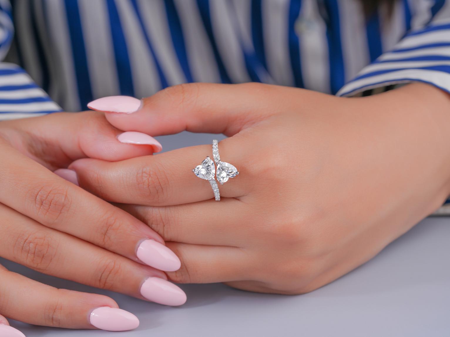 two heart ring with heart shaped diamond ring.
