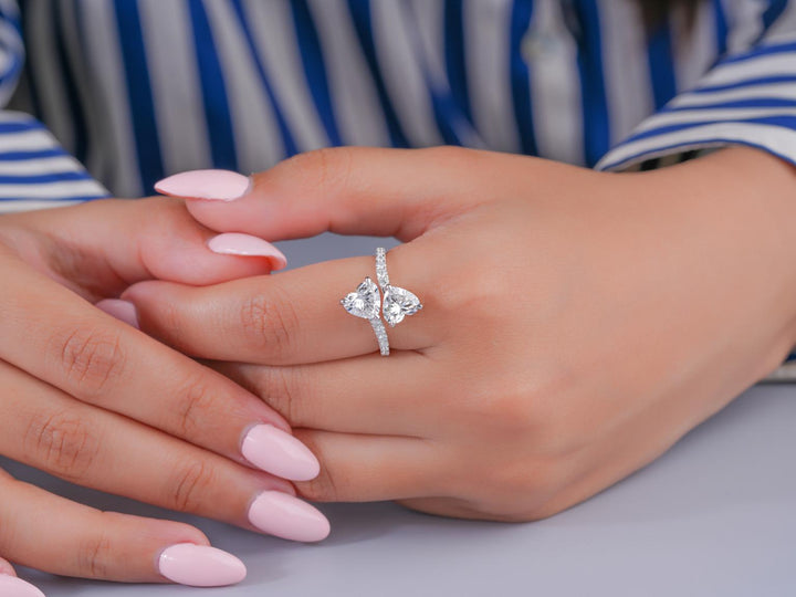 two heart ring with heart shaped diamond ring.
