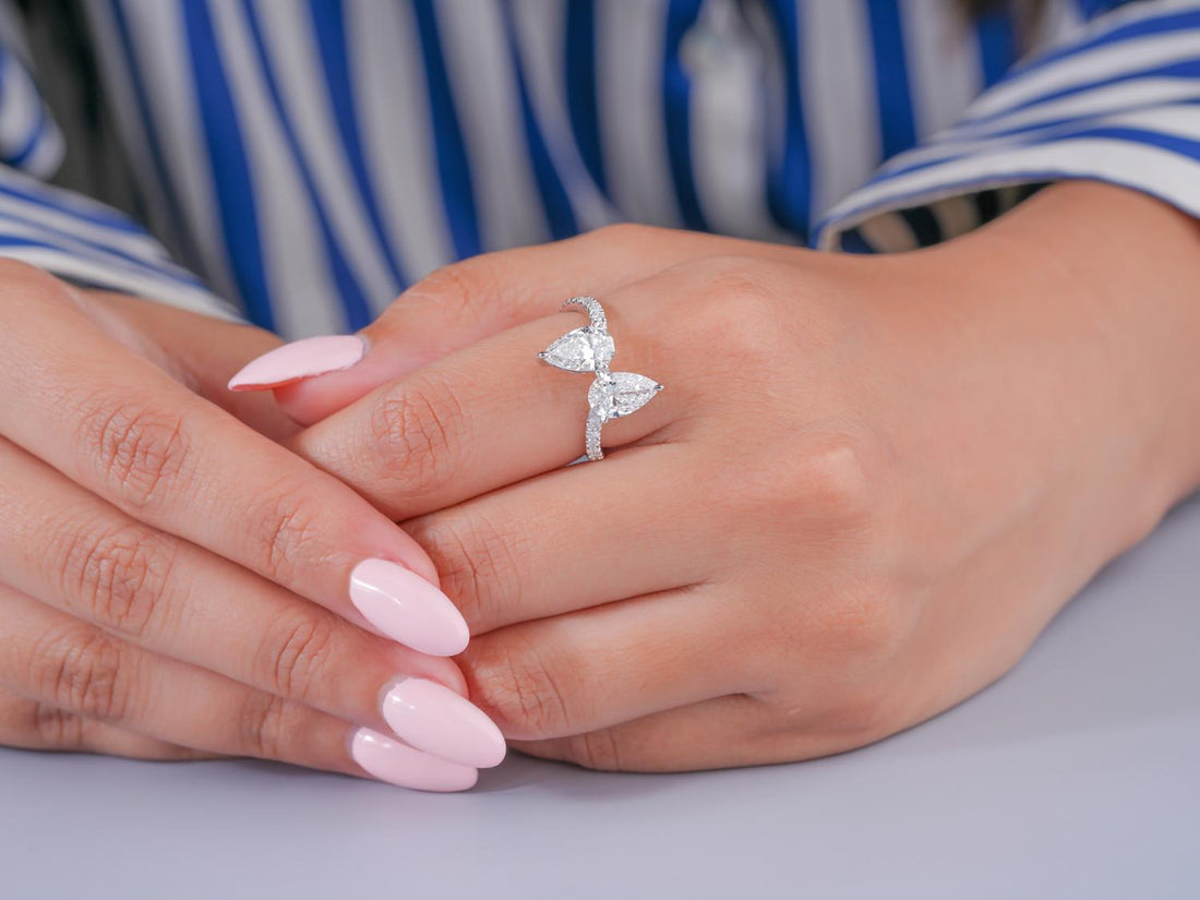pear shaped diamond ring in pear cut ring style.
