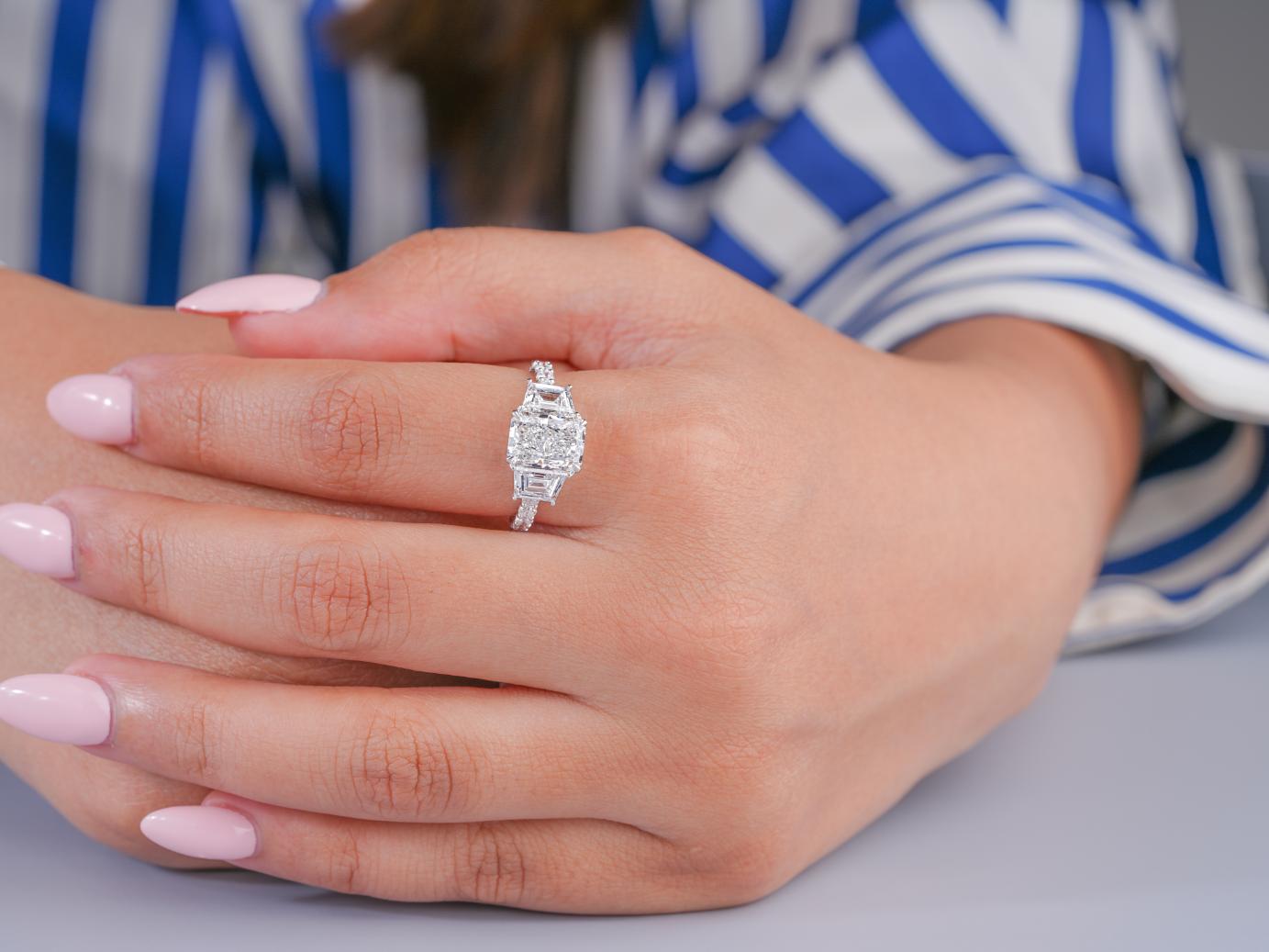 three stone ring in cushion diamond ring style.
