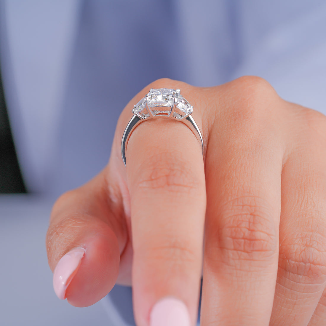 half moon cut side stone with past present future ring.
