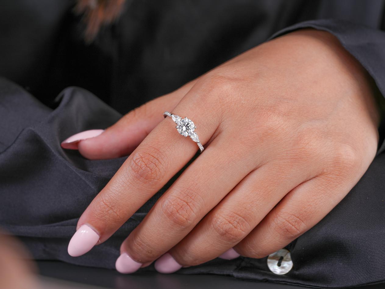 tapered shank ring in three stone diamond ring style.
