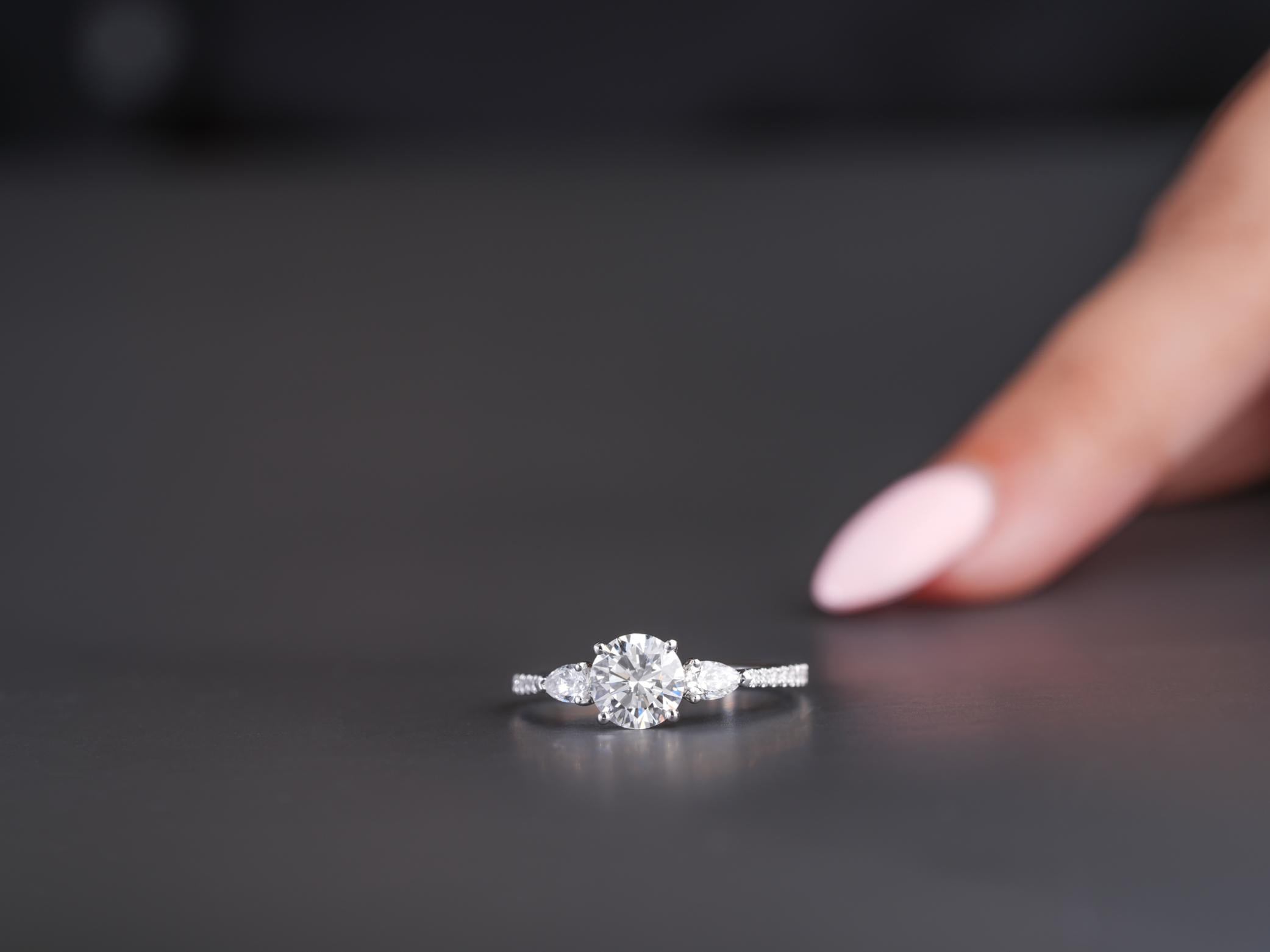 lumera engagement ring featuring lumera diamond ring.
