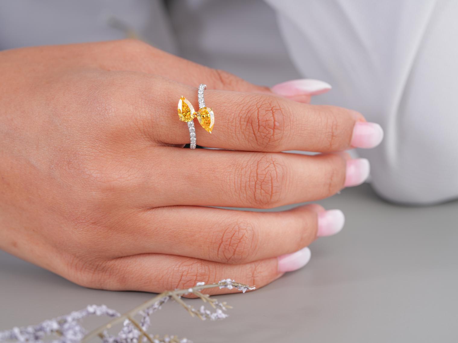yellow pear cut ring in pear engagement ring style.
