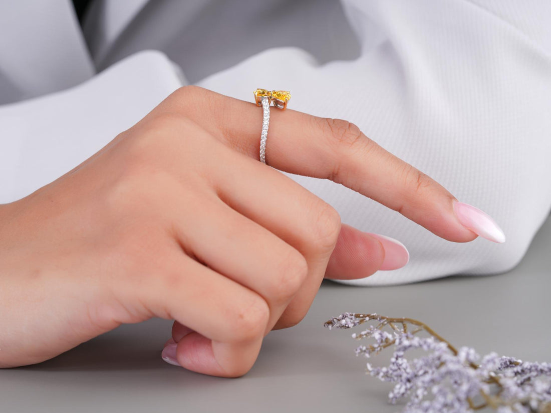 bypass engagement ring with fancy color ring.

