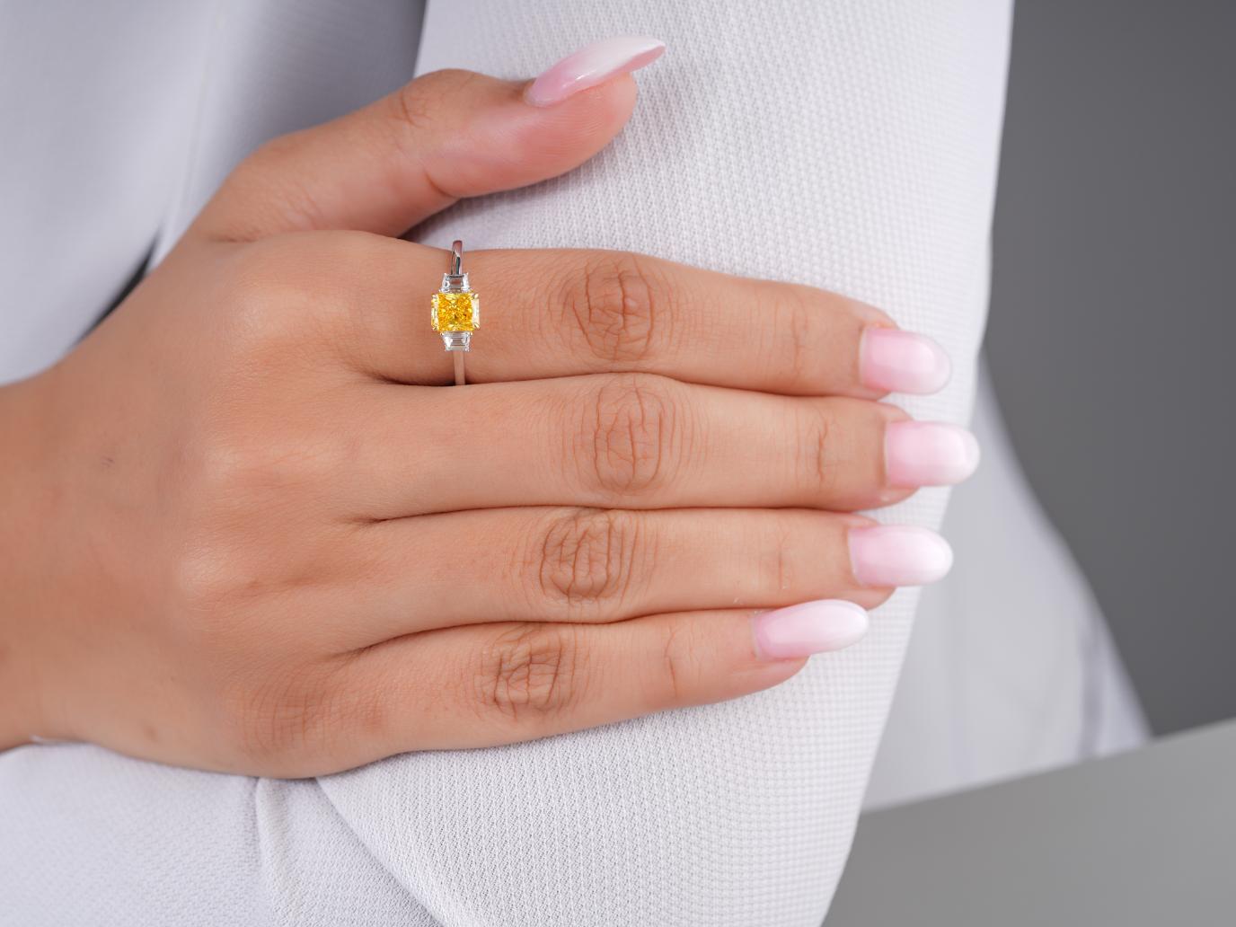 yellow diamond ring with yellow radiant cut ring.
