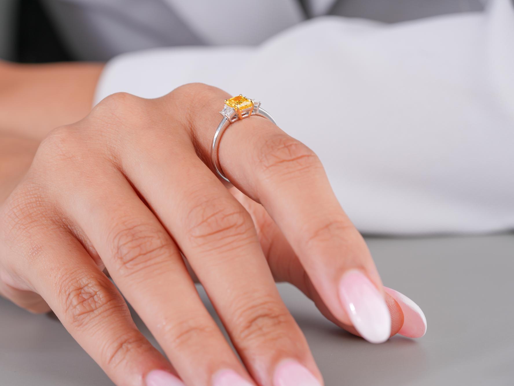 color stone diamond ring with two tone gold ring.
